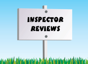 a white sign with black text the reads "inspector reviews: