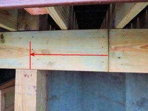 a wooden post supporting a beam